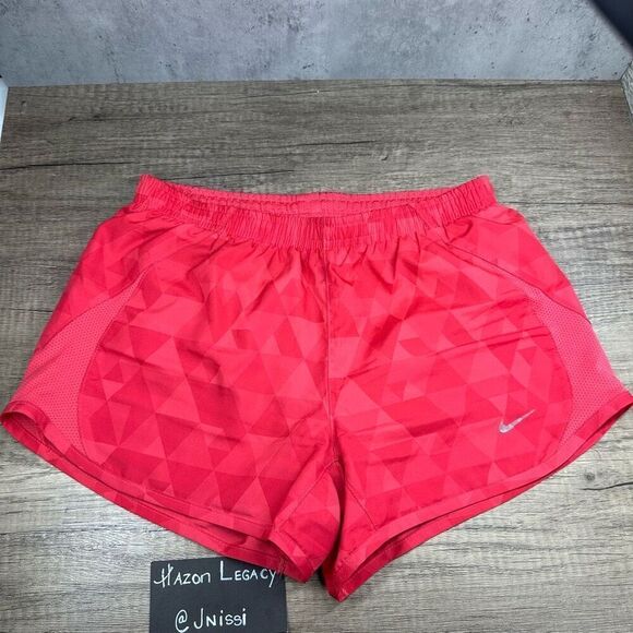 Nike Pants - Nike~Women's~5K running shorts with liner printed red~(575097-601)~Size XS‎